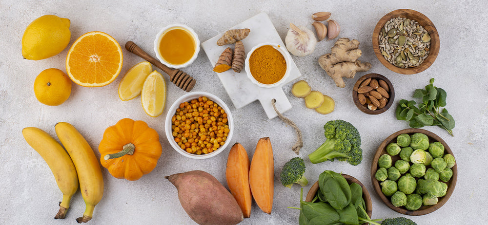 Image has varied kind of food like fruits, vegetables, and pulses that have natural digestive enzymes for a healthy gut