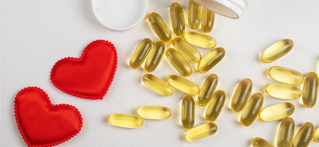 An image of Omega 3 capsules and a heart, indicating it is heart health supplements to maintain a healthy lifestyle