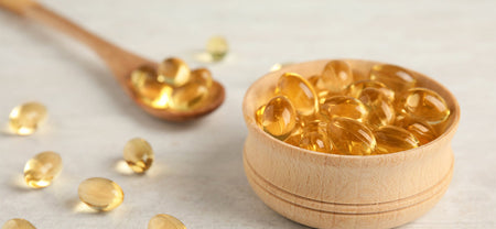 Bowl containing Omega 3 fatty acids capsules which help for boosting immunity | Healthy Lifestyle
