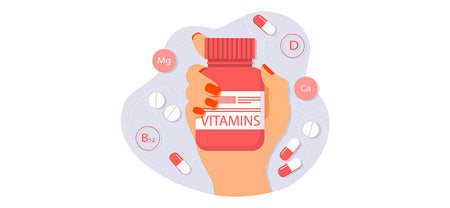 A female hand holding a bottle of multivitamin supplements showing the multivitamin ingredients for women's healthcare