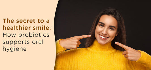 A girl pointing towards her mouth showing a healthy smile and maintaining a good oral hygiene.